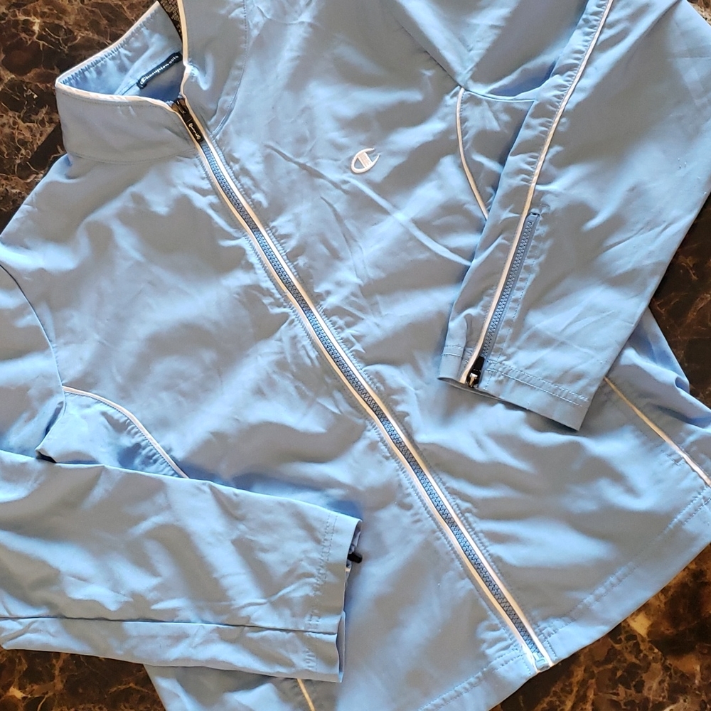 Champion elite baby blue Light jacket 💙 size medium.